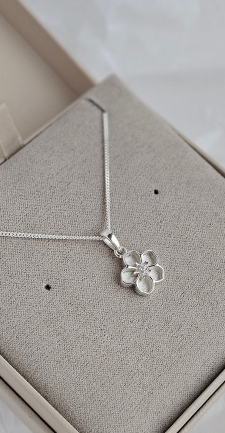 Forget Me Not – Keepsake Flower Necklace with CZ Center